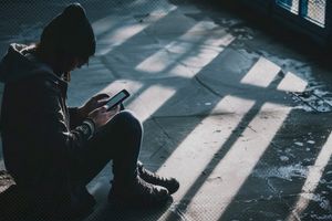2024 11 26 unhappy youth phone